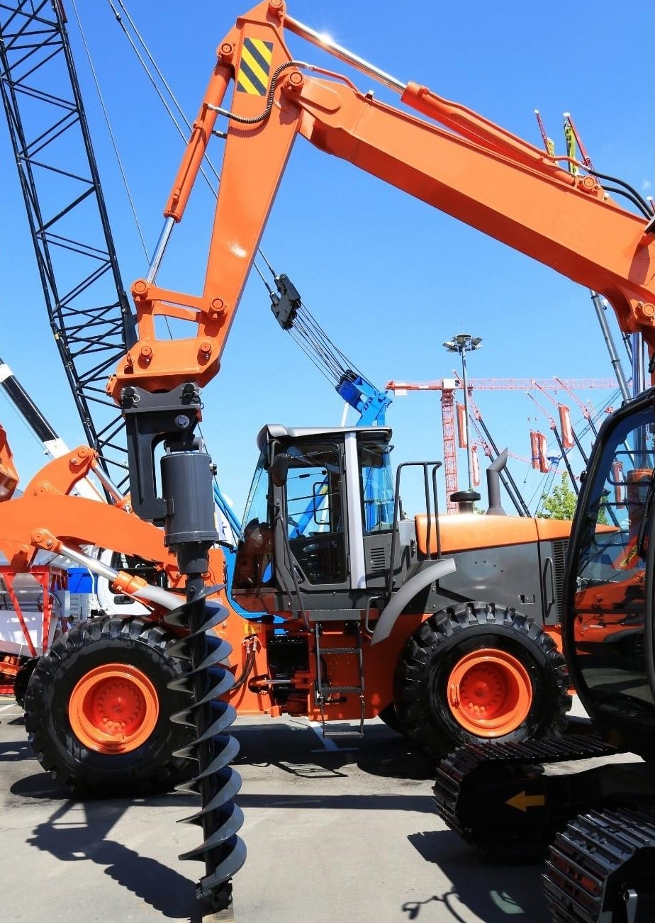 Sample of industrial vehicle with earth auger drill attachment